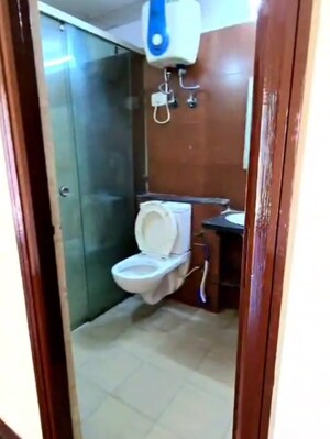Bathroom in 3 BHK Apartment at Mahagun Moderne, Sector 78 – for Sale