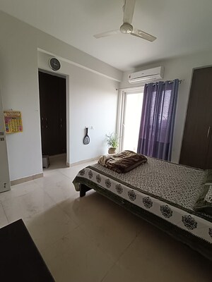 Bedroom in 4 BHK Apartment at Mahagun Mirabella, Sector 79 – for Rent