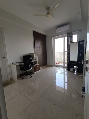 Living Room in 4 BHK Apartment at Mahagun Mirabella, Sector 79 – for Rent
