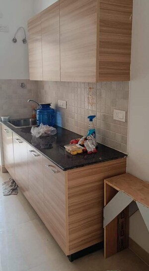 Kitchen in 3 BHK Apartment at ATS Happy Trails, Sector 10 Greater Noida – for Rent