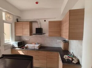 Kitchen in 3 BHK Apartment at ATS Happy Trails, Sector 10 Greater Noida – for Rent