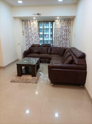 Living Room in 2 BHK Apartment at Tharwani Rosewood Heights, Kharghar Sector 10 – for Sale