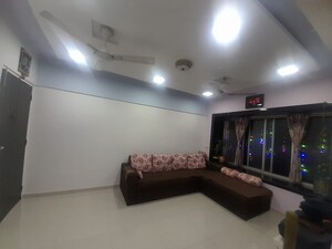 Living Room in 2 BHK Apartment at Surya Gokul Gagan, Kandivali East – for Rent
