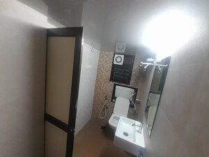 Bathroom in 2 BHK Apartment at Surya Gokul Gagan, Kandivali East – for Rent