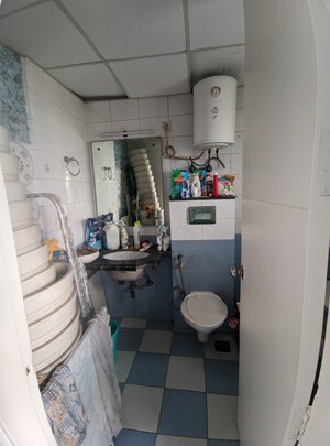 Bathroom in 2 BHK Apartment at Eros Kenwood Tower, Sector 39 – for Sale