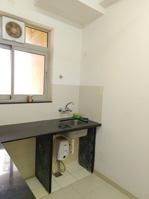Kitchen in 1 BHK Apartment at Hiranandani Fortune City, New Panvel – for Rent