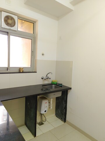 Kitchen in 1 BHK Apartment at Hiranandani Fortune City, New Panvel – for Rent