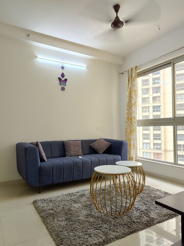 Living Room in 1 BHK Apartment at Hiranandani Fortune City, New Panvel – for Rent