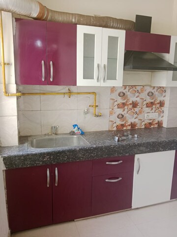 Kitchen in 2 BHK Apartment at Eureka Diya Green City, Raj Nagar Extension – for Rent