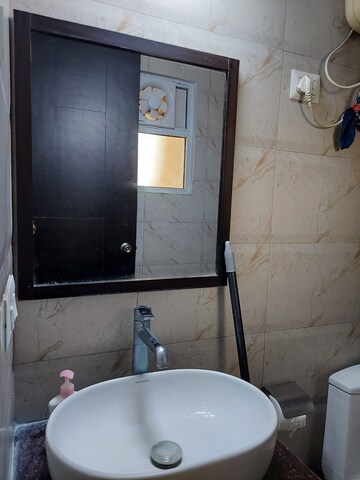 Bathroom in 3 BHK Apartment at Landcraft Golflink Villas, Pandav Nagar – for Rent