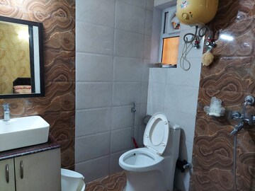 Bathroom in 3 BHK Apartment at Landcraft Golflink Villas, Pandav Nagar – for Rent