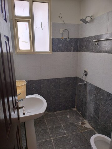 Bathroom in 3 BHK Builder Floor at Prem Satyam Swastik Apartment, Patiala Road – for Sale