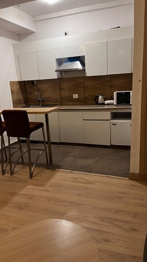 Kitchen in 2 BHK Apartment at Supertech Cape Town, Sector 74 – for Sale