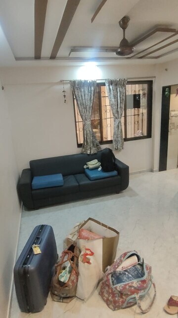 Living Room in 2 BHK Apartment at Swanand CHS Naupada, Naupada – for Rent