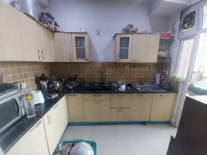 Kitchen in 2 BHK Apartment at Amrapali Dream Valley, Tech Zone 4 Greater Noida – for Rent