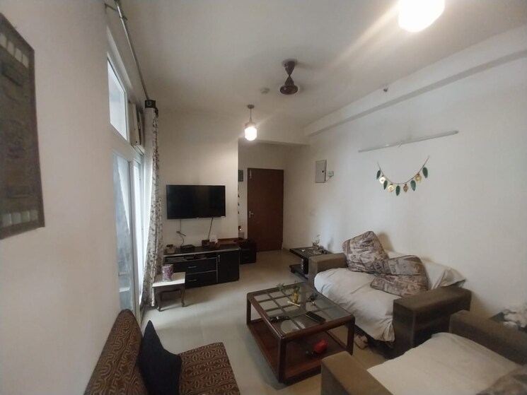Living Room, amrapali-dream-valley 2 Bedroom 810 Sq.Ft. Apartment In Tech Zone 4 Greater Noida Greater Noida 9437378