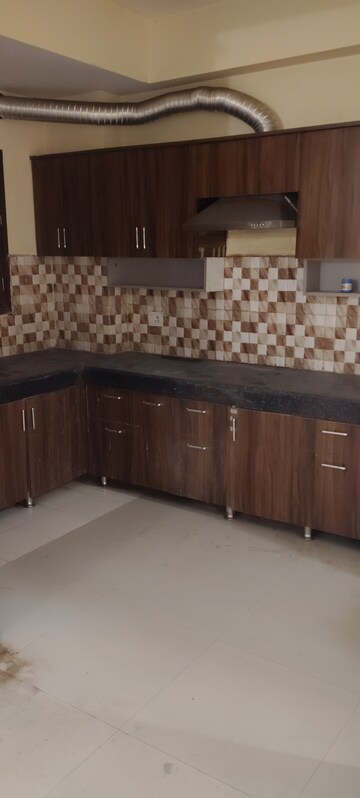 Kitchen in 3 BHK Apartment at Puri Pranayam, Sector 82 – for Rent