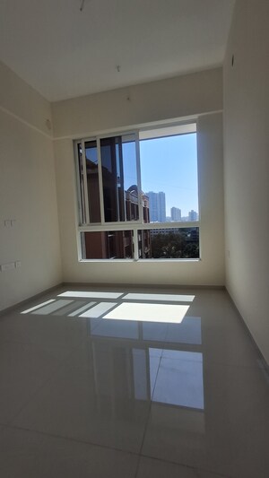 Room in 2.5 BHK Apartment at Wadhwa TW Gardens, Kandivali East – for Sale