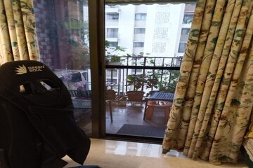 Living Room in 1.5 BHK Apartment at Lodha Lakeshore Greens, Dombivli East – for Sale