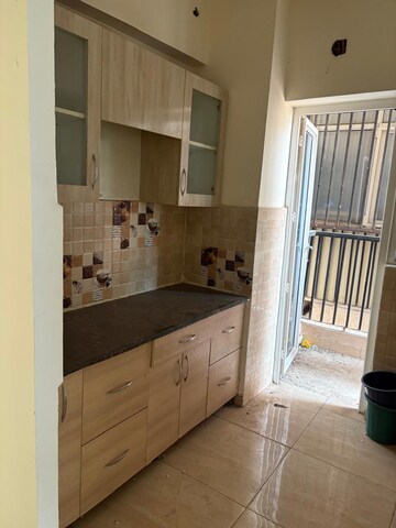 Kitchen in 2 BHK Apartment at Gaur City 5th Avenue, Sector 4 Greater Noida – for Rent