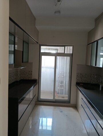 Kitchen in 3 BHK Apartment at Mahavir Square, Manpada – for Sale