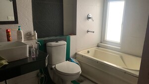 Bathroom in 3 BHK Apartment at Panchsheel Sps Heights, Ahinsa Khand 2 – for Rent