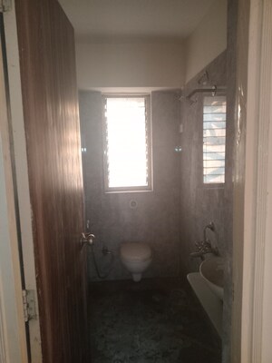 Bathroom in 2 BHK Apartment at Bharat Ecovistas, Shilphata – for Rent