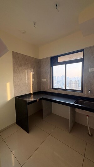 Kitchen in 1 BHK Apartment at Chandak 34 Park Estate, Goregaon West – for Sale