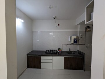 Kitchen in 2 BHK Apartment at Duville Riverdale Heights, Kharadi – for Rent