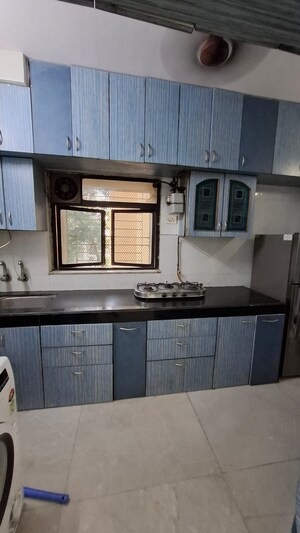 Kitchen in 2 BHK Apartment at Powai Cosmopolitan CHS, Powai – for Rent
