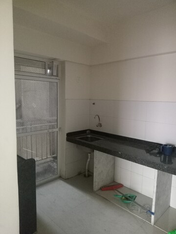 Kitchen in 2 BHK Apartment at Bharat Ecovistas, Shilphata – for Rent