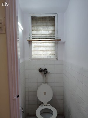 Bathroom in 1 BHK Apartment at Rizvi Heights, Senapati Bapat Marg – for Sale