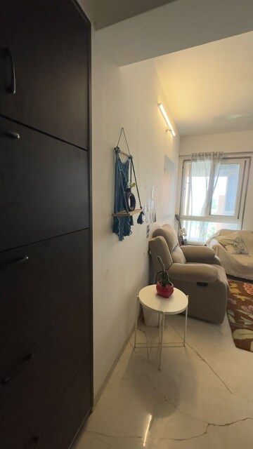 Living Room in 2 BHK Apartment at Unique group Zest County, Lohgaon – for Rent