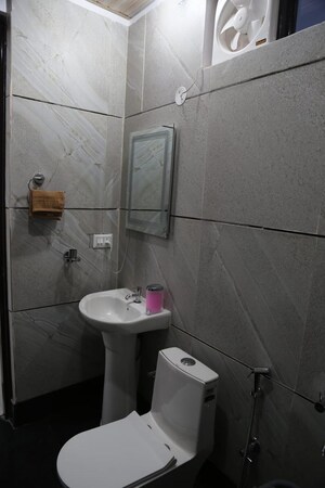 Bathroom in 2 BHK Builder Floor at Misty Hillocks, Salan Gaon – for Rent