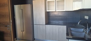 Kitchen in 3.5 BHK Apartment at M3M Golf Estate Fairway East, Sector 65 – for Sale