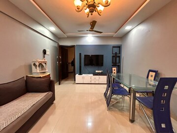 Living Room in 2 BHK Apartment at Suncity Jupiter, Powai – for Rent