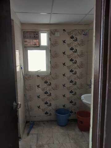 Bathroom in 1 BHK Apartment at Nilaya Greens, Raj Nagar Extension – for Rent