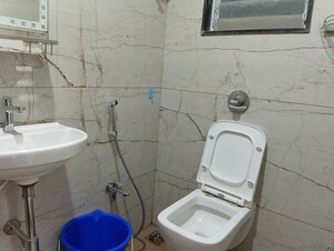 Bathroom in 2 BHK Apartment at Oxford Navrang Crystal, Goregaon West – for Rent