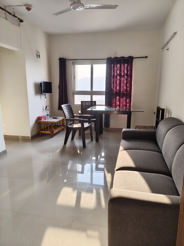 Living Room in 1 BHK Apartment at Indiabulls Greens, New Panvel – for Rent