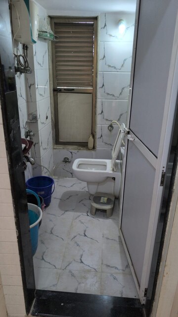 Bathroom in 2 BHK Apartment at Gaurav Valley, Mira Road – for Sale