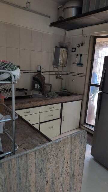 Kitchen in 2 BHK Apartment at Gaurav Valley, Mira Road – for Sale