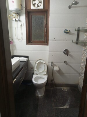 Bathroom in 3 BHK Builder Floor at RWA Chittaranjan Park Block R, Chittaranjan Park – for Rent