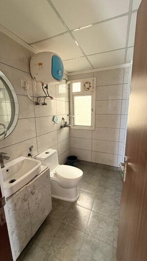 Bathroom in 1 BHK Apartment at Nilaya Greens, Raj Nagar Extension – for Sale