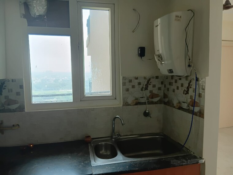 Kitchen, gaurs-siddhartham 2 Bedroom 1055 Sq.Ft. Apartment In Siddharth Vihar Ghaziabad 9441144