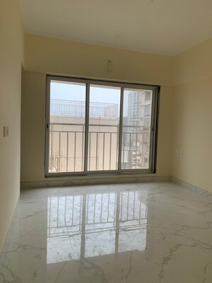 Room in 2 BHK Apartment at Kosmos Kedar Darshan, Borivali West – for Rent