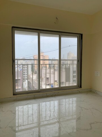 Room in 2 BHK Apartment at Kosmos Kedar Darshan, Borivali West – for Rent