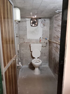 Bathroom in 2 BHK Apartment at Evershine Park, Andheri West – for Rent