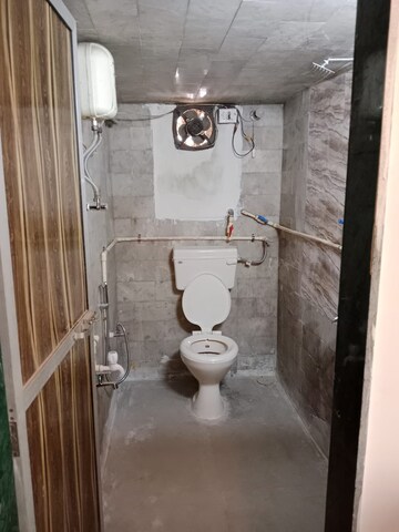 Bathroom in 2 BHK Apartment at Evershine Park, Andheri West – for Rent