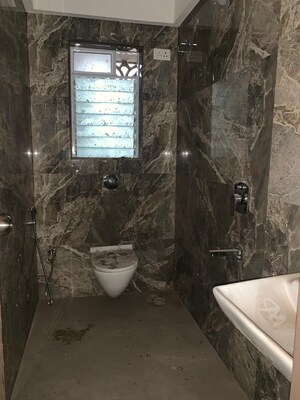 Bathroom in 2 BHK Apartment at Shamik Keshav CHS, Borivali West – for Rent