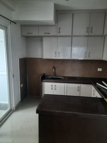 Kitchen in 2 BHK Apartment at Jaypee Sports City, Jaypee Greens Sports City – for Rent